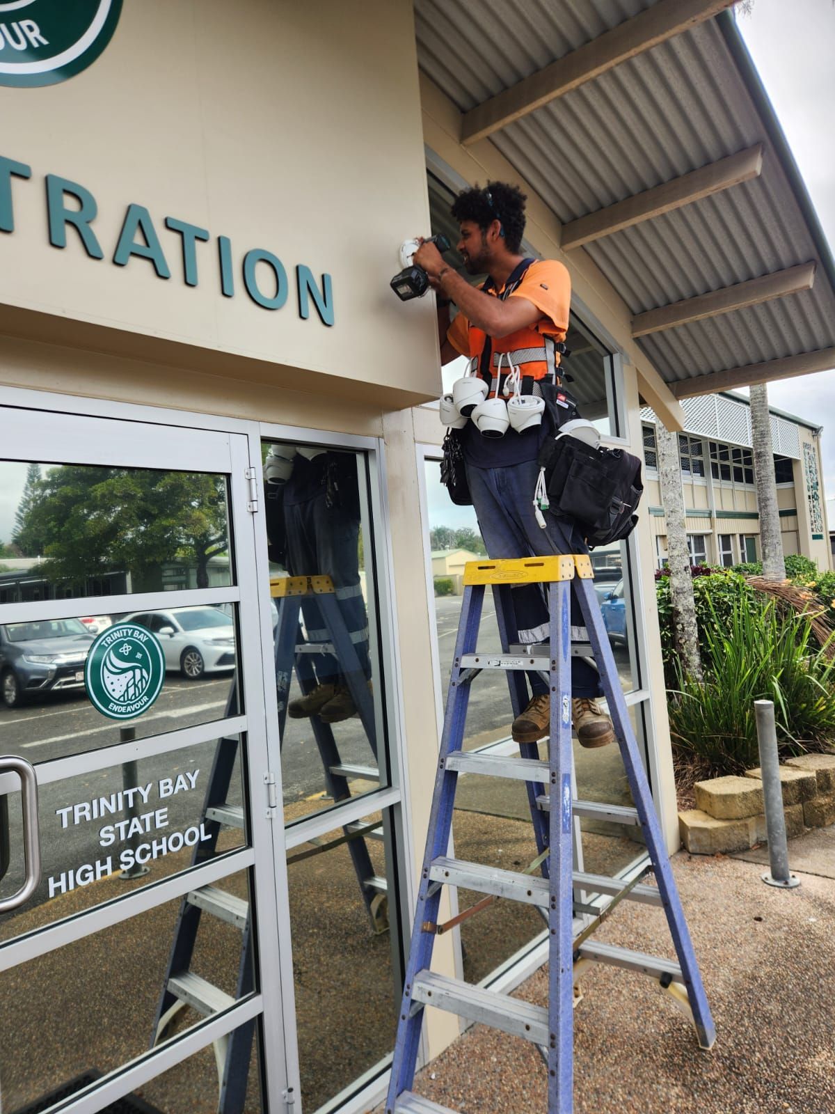 Security Camera on a Tall Pole Mounted Above a Concrete Barrier — NQ Video Surveillance in Bungalow, QLD