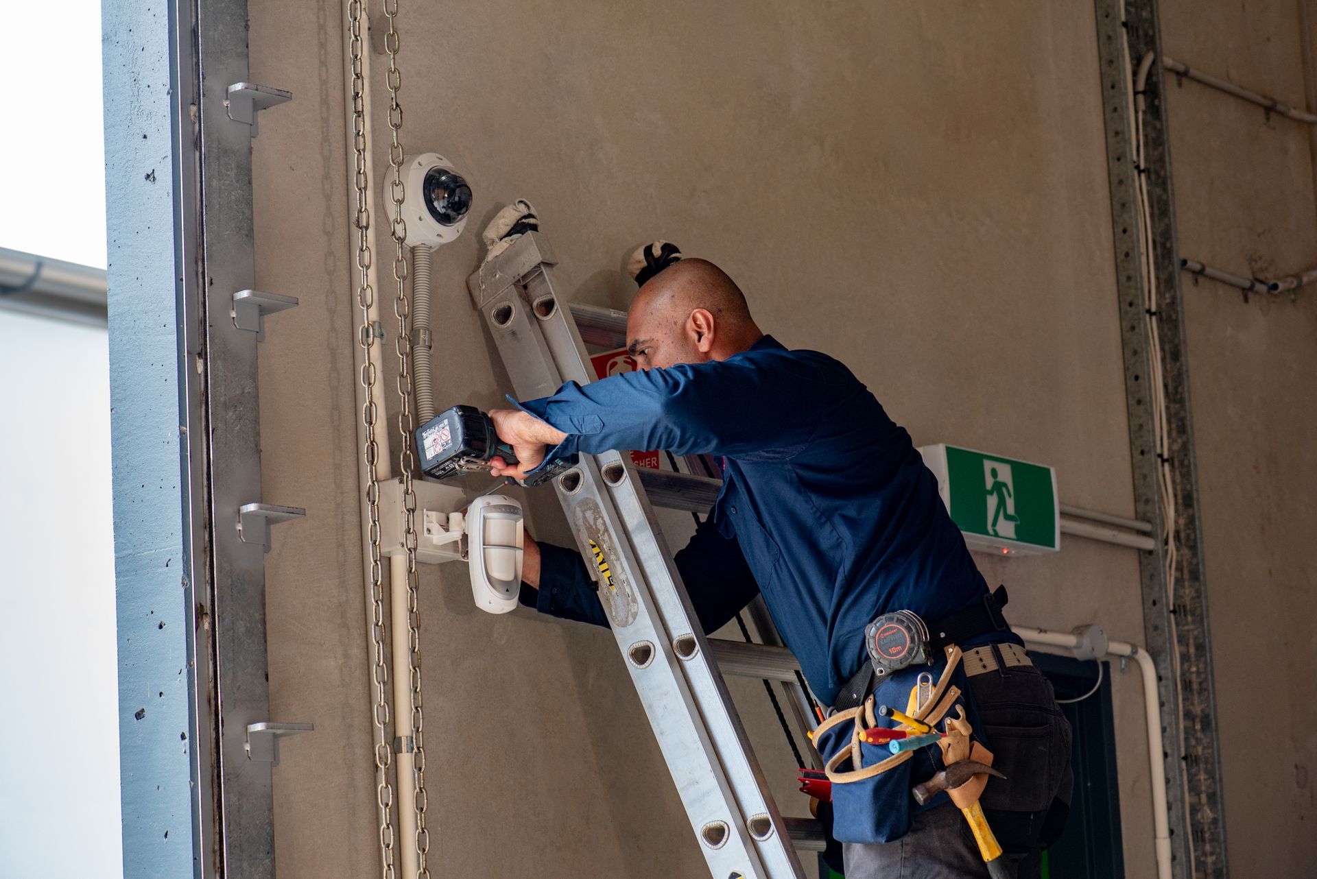 White Security Camera Mounted on a Building's Exterior — NQ Video Surveillance in Cape York, QLD