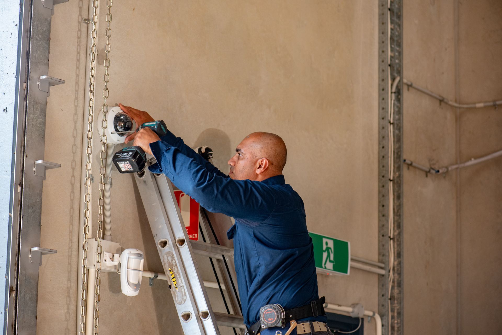 Security Cameras Mounted on a Pole Inside a Building — NQ Video Surveillance in Bungalow, QLD