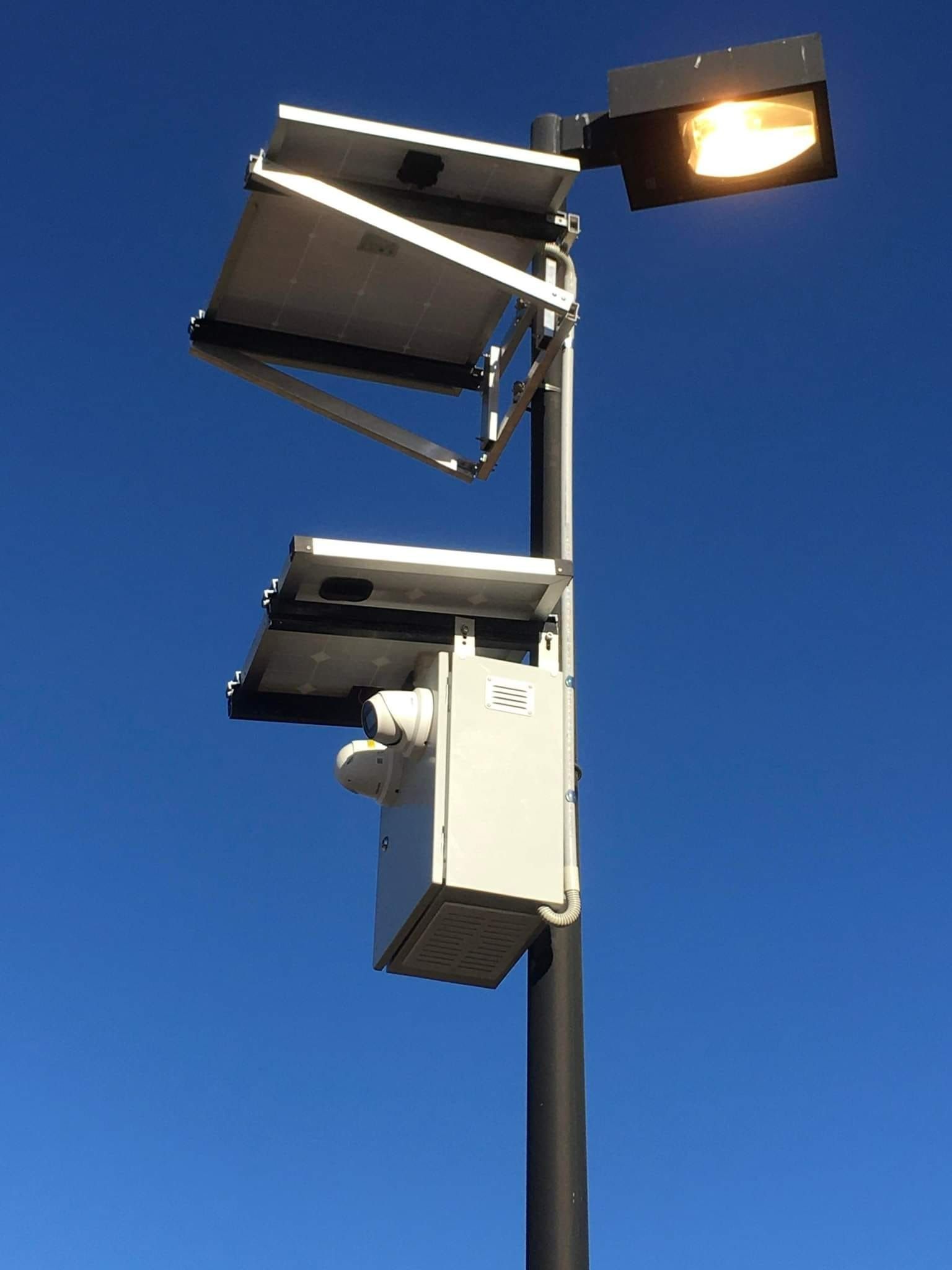 Light Pole and CCTV With Solar Panels — NQ Video Surveillance in Bungalow, QLD
