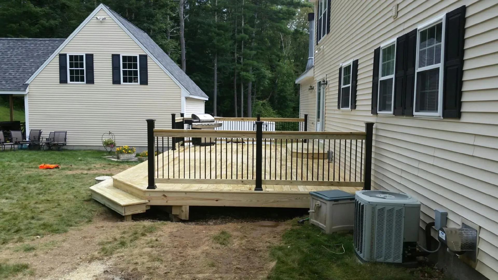 Beige House Wooden Deck — North Brookfield, MA — Christian Carpenters