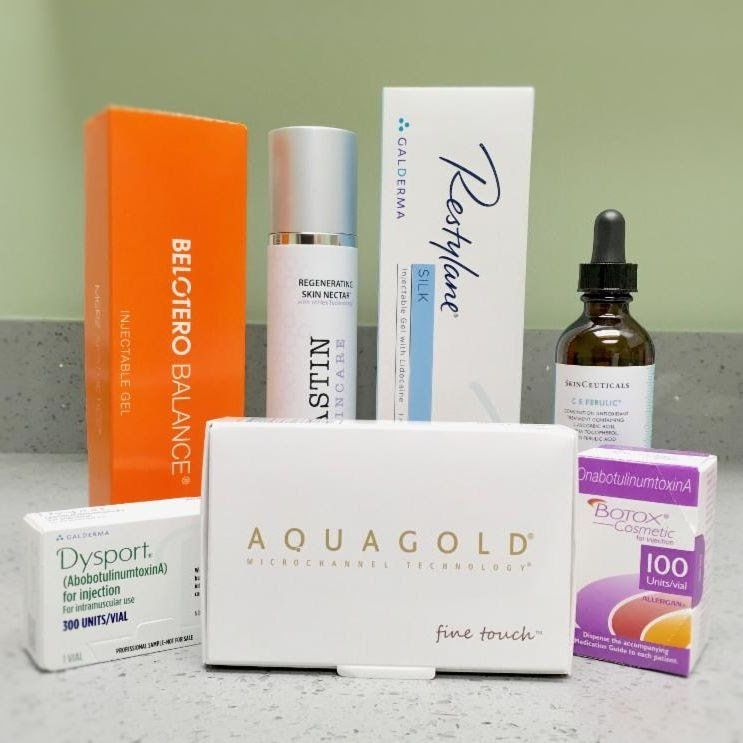 A variety of beauty products including a box of aquagold