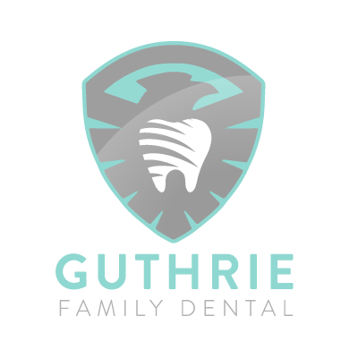 The logo for guthrie family dental shows a tooth on a shield.