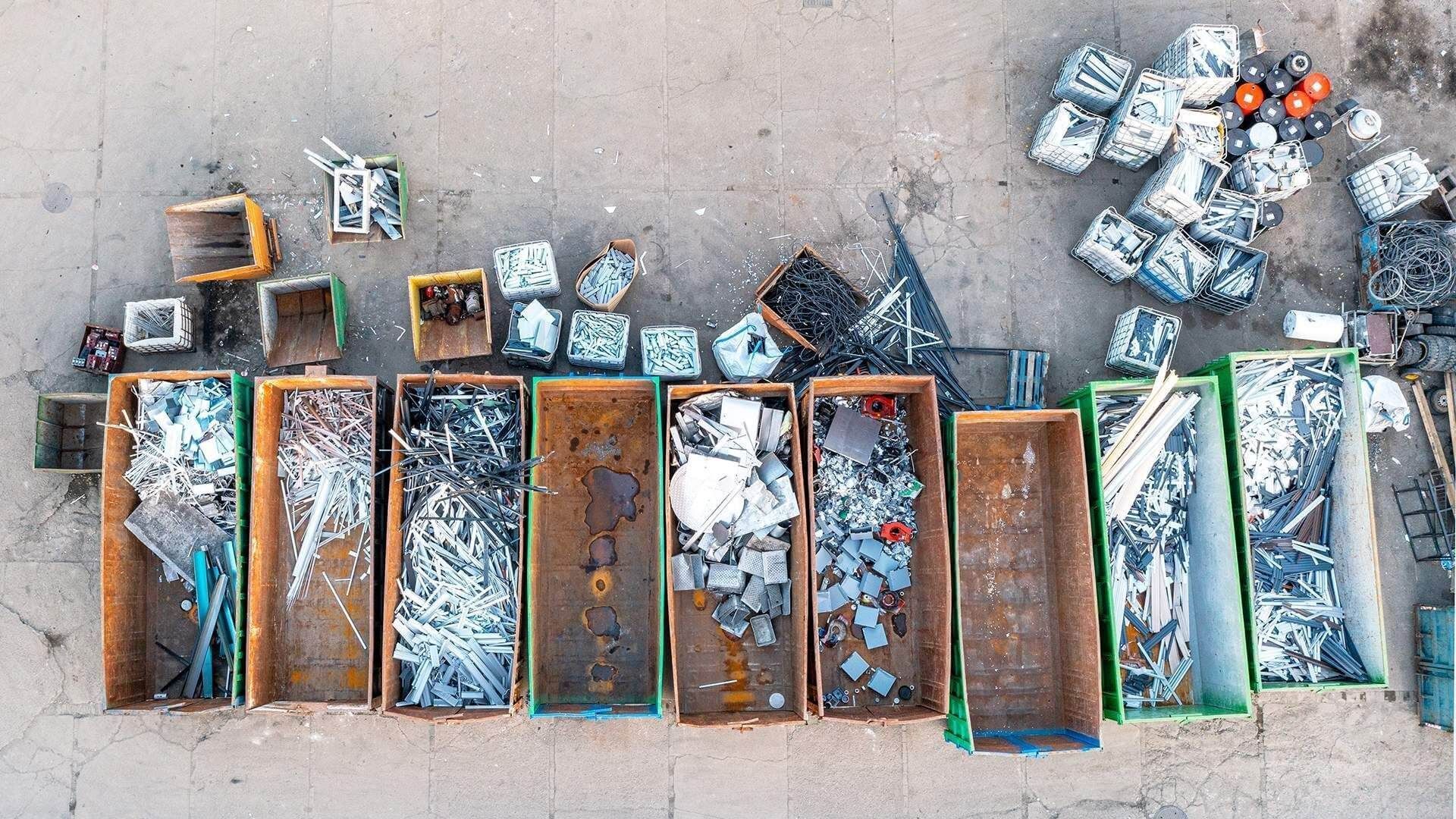 An aerial view of a pile of scrap metal in crates.