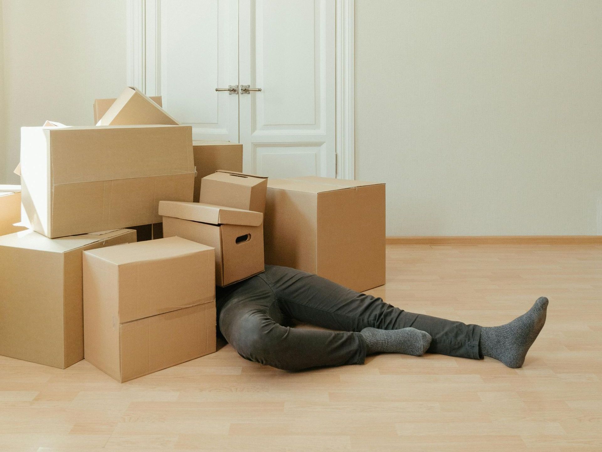 A large warehouse filled with lots of boxes and shelves.
