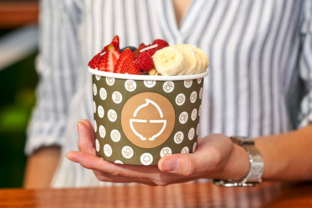 Woman Holding an Acai Bowl  — Quench Juice Bar in Fortitude Valley, QLD
