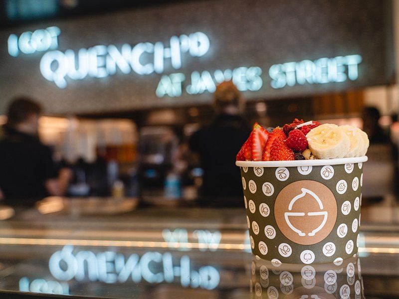 Acai Bowl with Quench Sign Background — Quench Juice Bar in Fortitude Valley, QLD