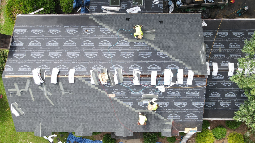 Drone aerial image of a North Chesterfield home where RETEX crew members are installing a new asphalt shingle roof.