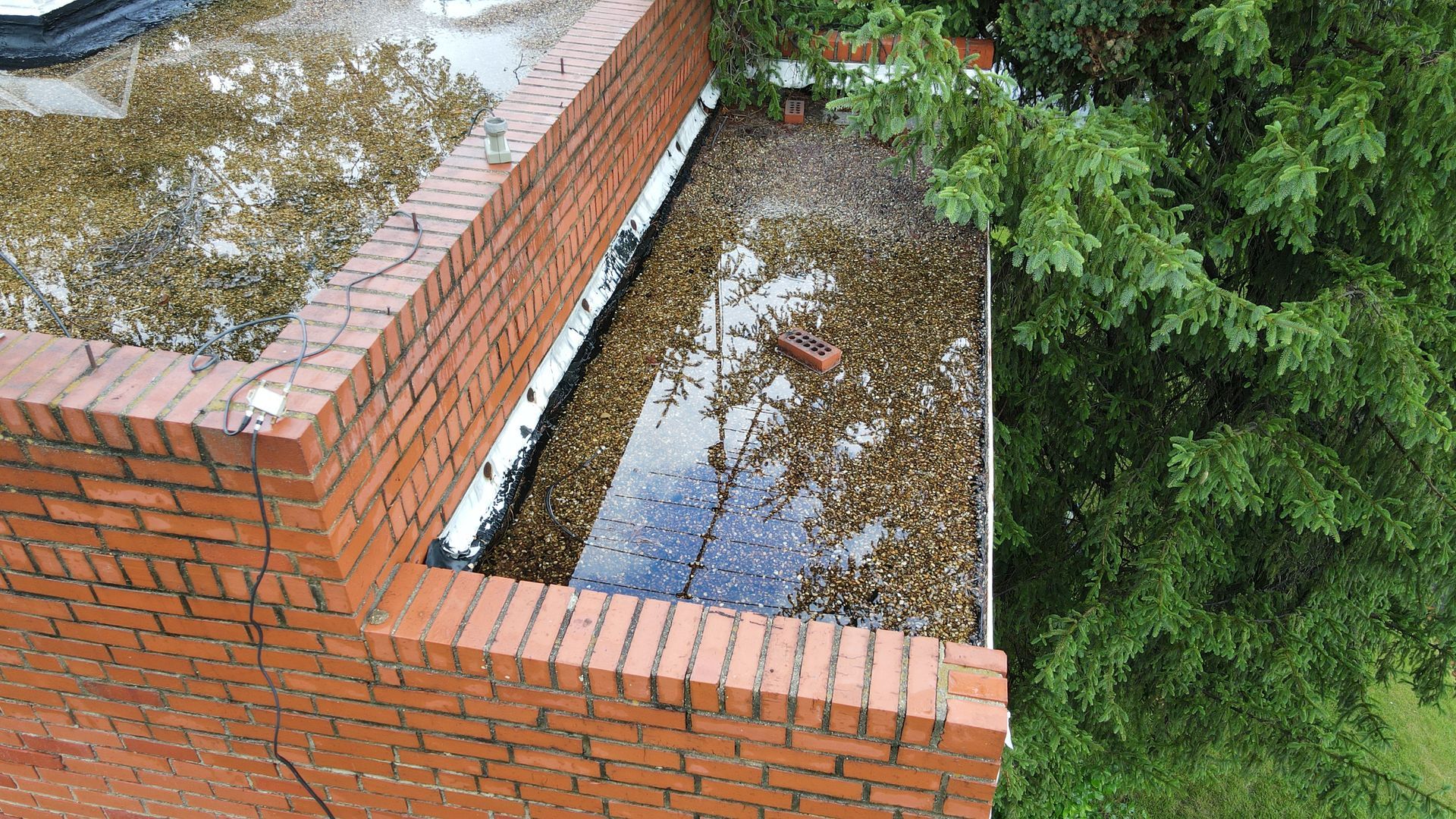 Image of flat roof pooling in Richmond VA. Photo taken by RETEX's Caleb Kammerling.
