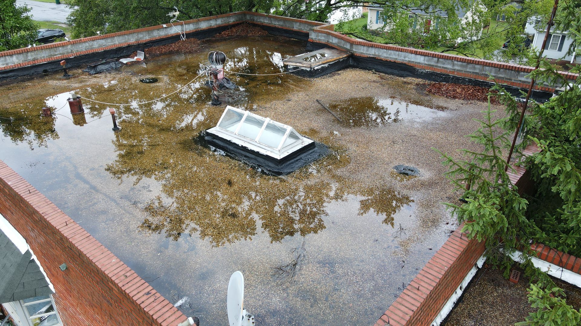 Image of flat roof pooling in Richmond VA. Photo taken by RETEX's Caleb Kammerling.