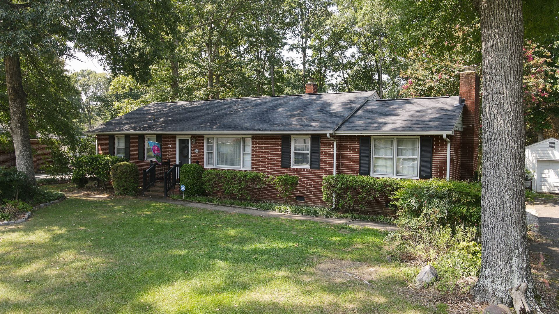 Owens Corning Oakridge shingle and modified bitumen flat roof replacement, 23235.