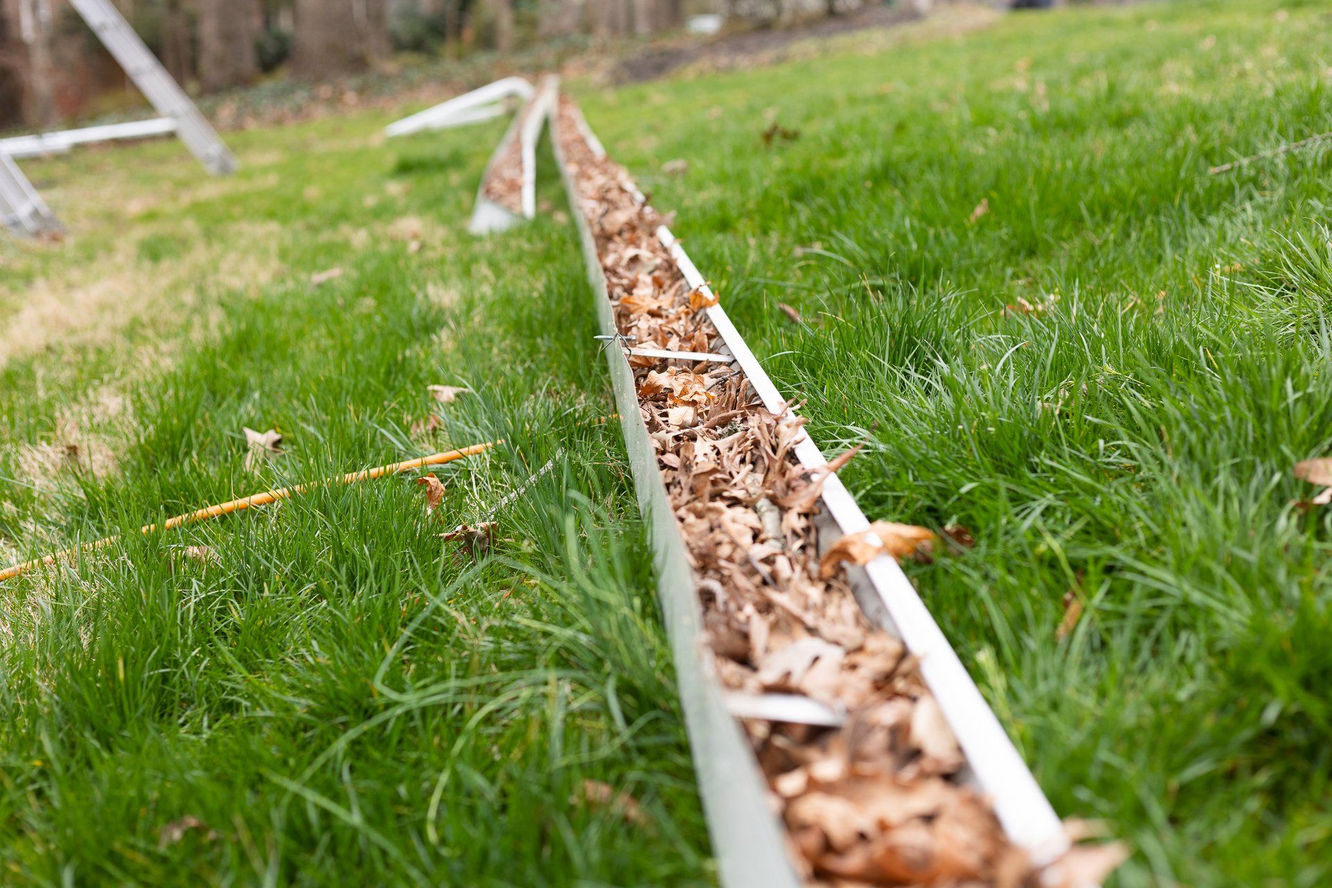 Image of old gutters after removal for gutter replacement in North Chestefield VA 23235.