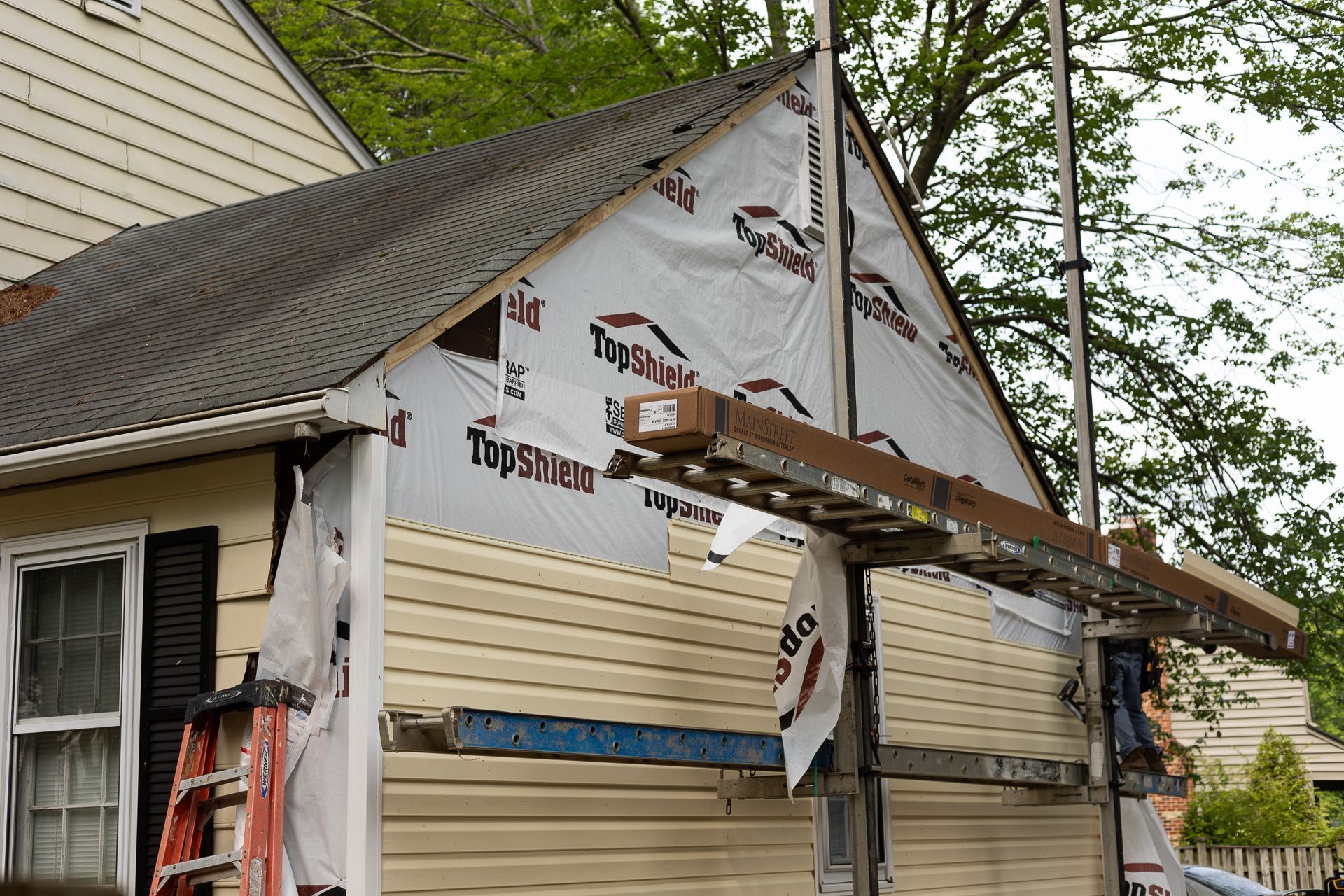 A during-installation image of RETEX siding installation in North Chesterfield VA 23235.
