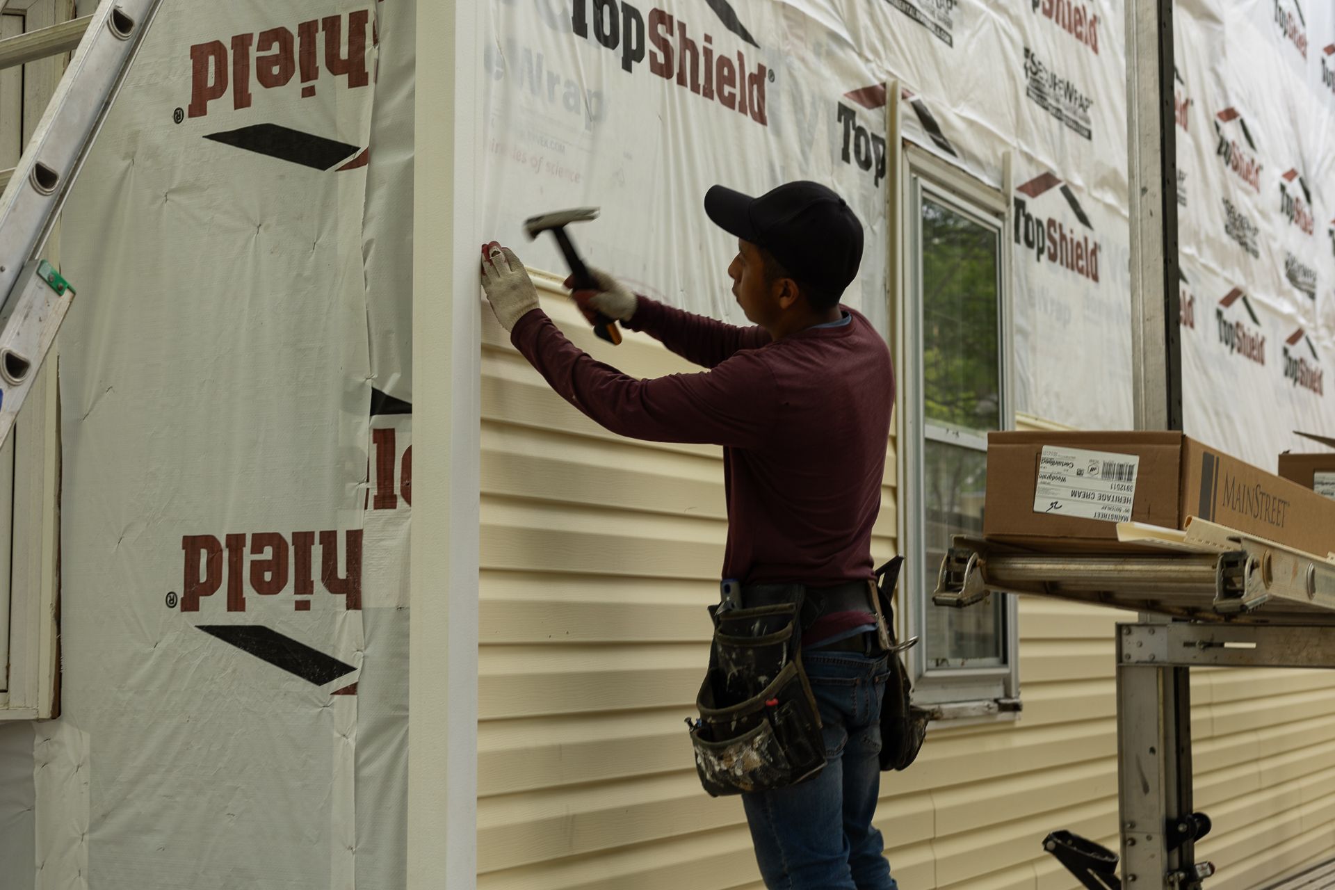 A during-installation image of RETEX siding installation in North Chesterfield VA 23235.