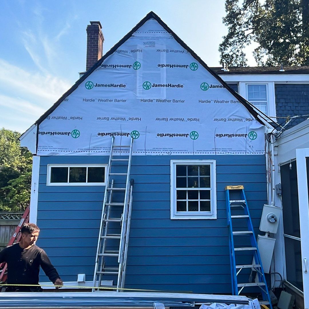 During-installation image of RETEX HardiePlank fiber cement siding installation in Richmond VA 23235.