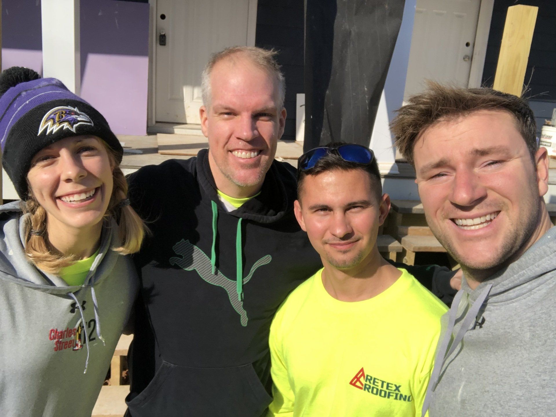 Selfie image of RETEX's Katelyn Lewis, Mark Erickson, Caleb Kammerling, and Josh Lewis at Richmond Habitat for Humanity.
