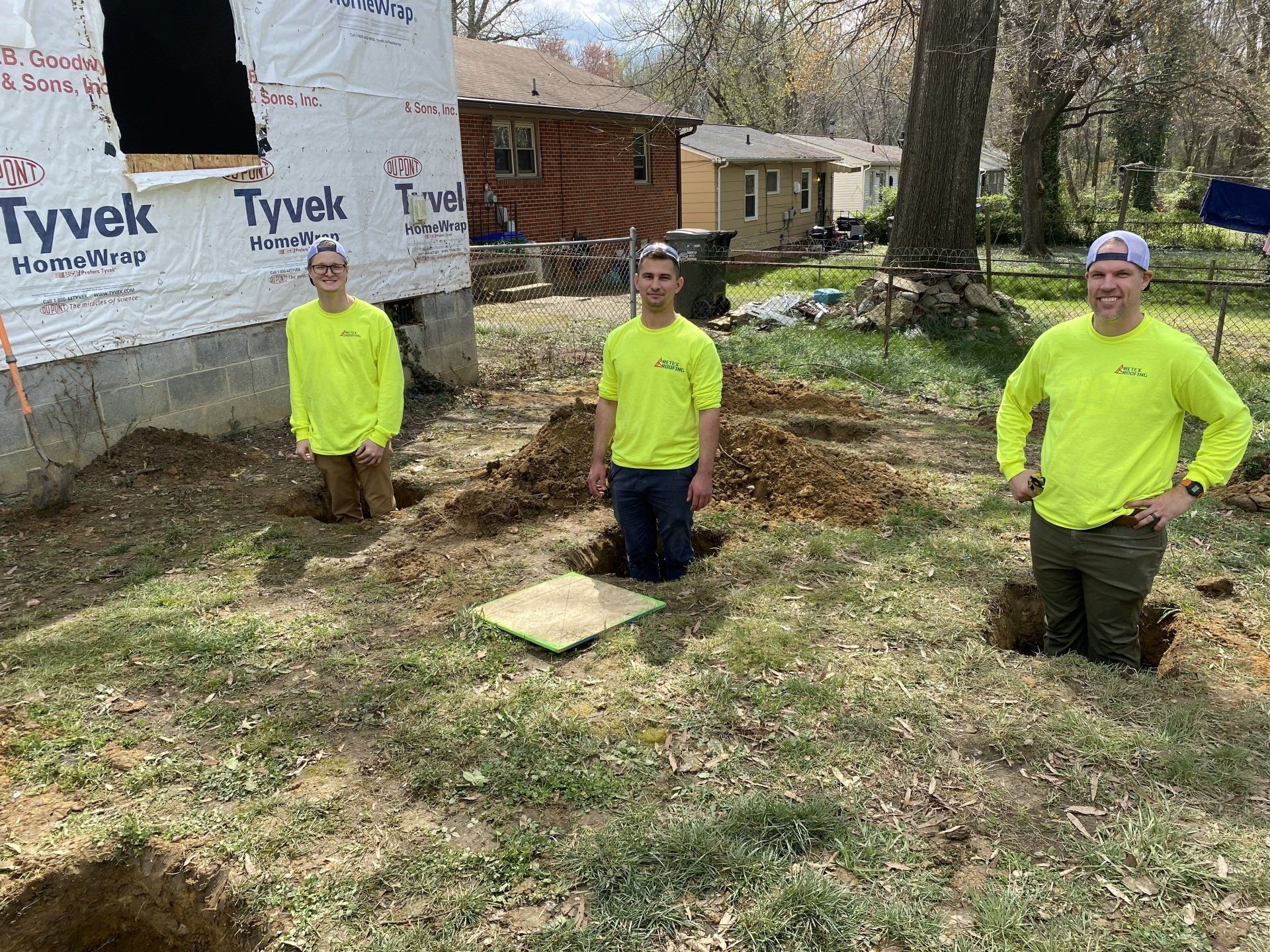 Image of RETEX's Caleb Hennon. Caleb Kammerling, and Mark Erickson at Richmond Habitat for Humanity.