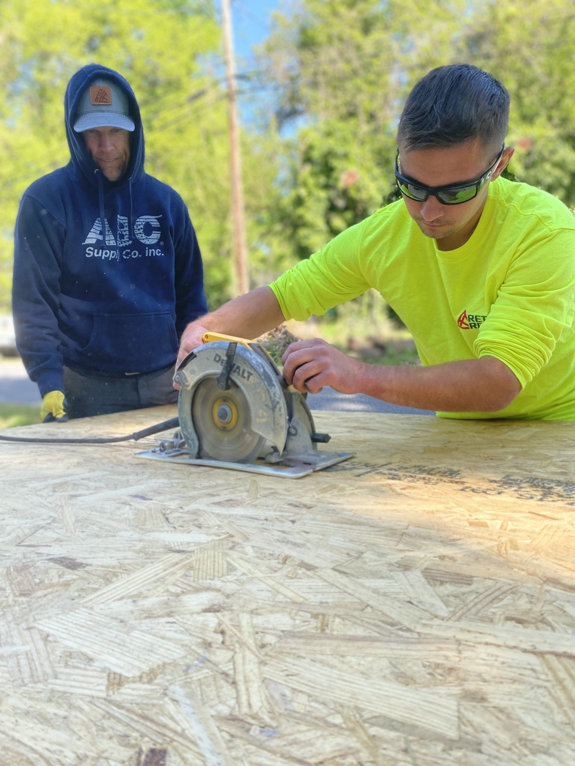 Image of RETEX’s Mark Erickson and Caleb Kammerling volunteering with Richmond Habitat for Humanity.