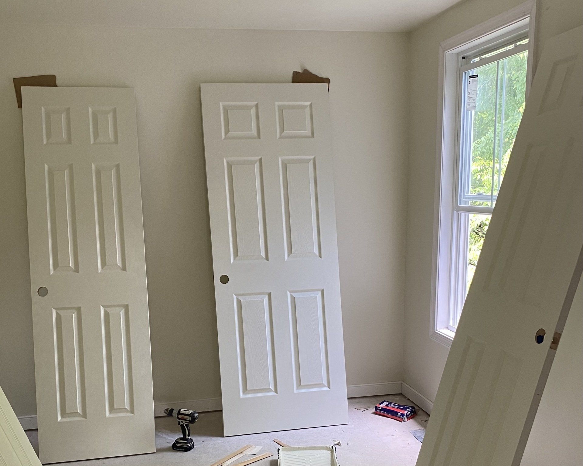 Image of doors ahead of installation at a Richmond Habitat for Humanity build site in June 2022.