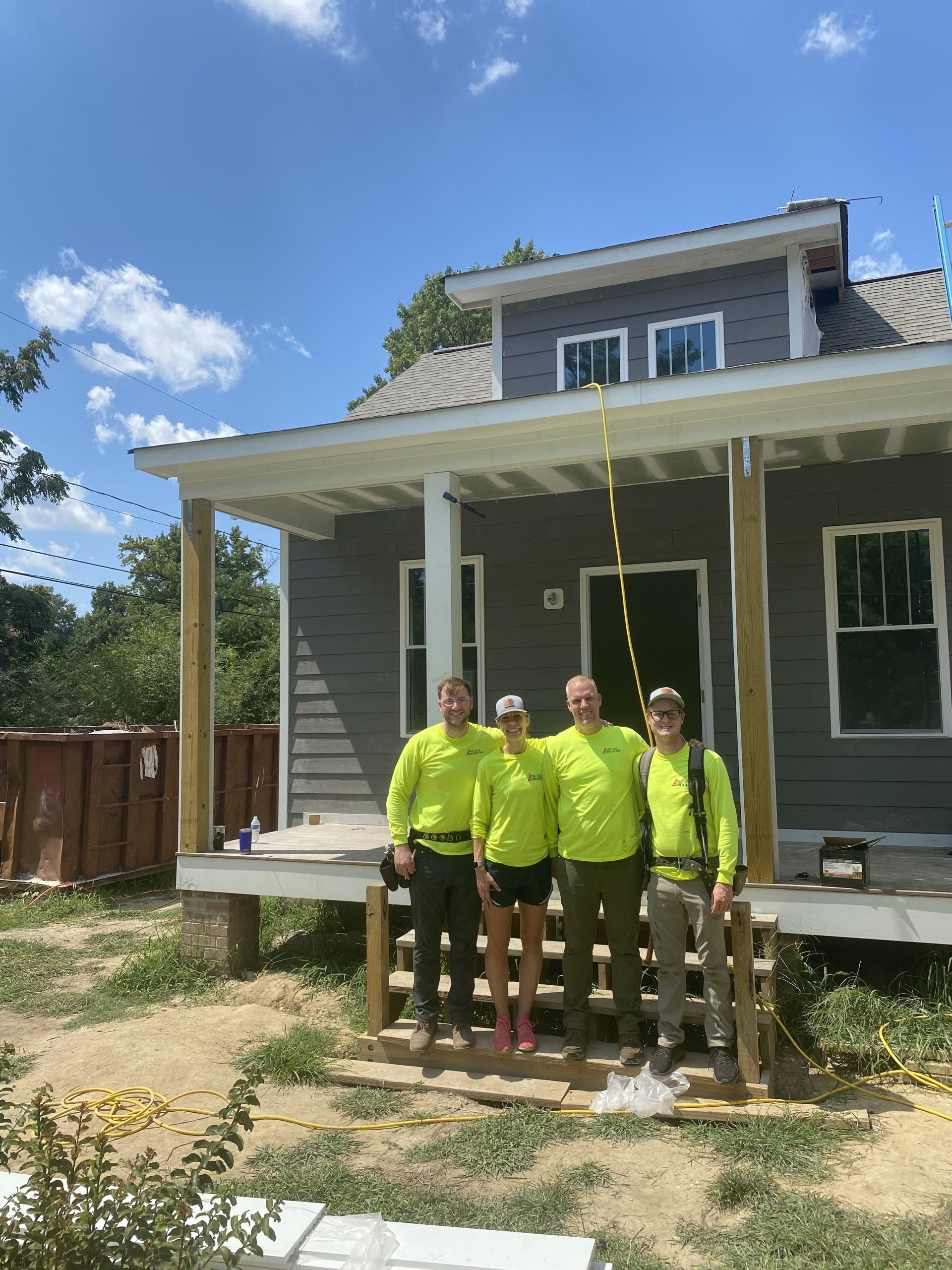 Image of RETEX’s Josh & Katelyn Lewis, Mark Erickson, and Caleb Hennon volunteering with Richmond Habitat for Humanity.
