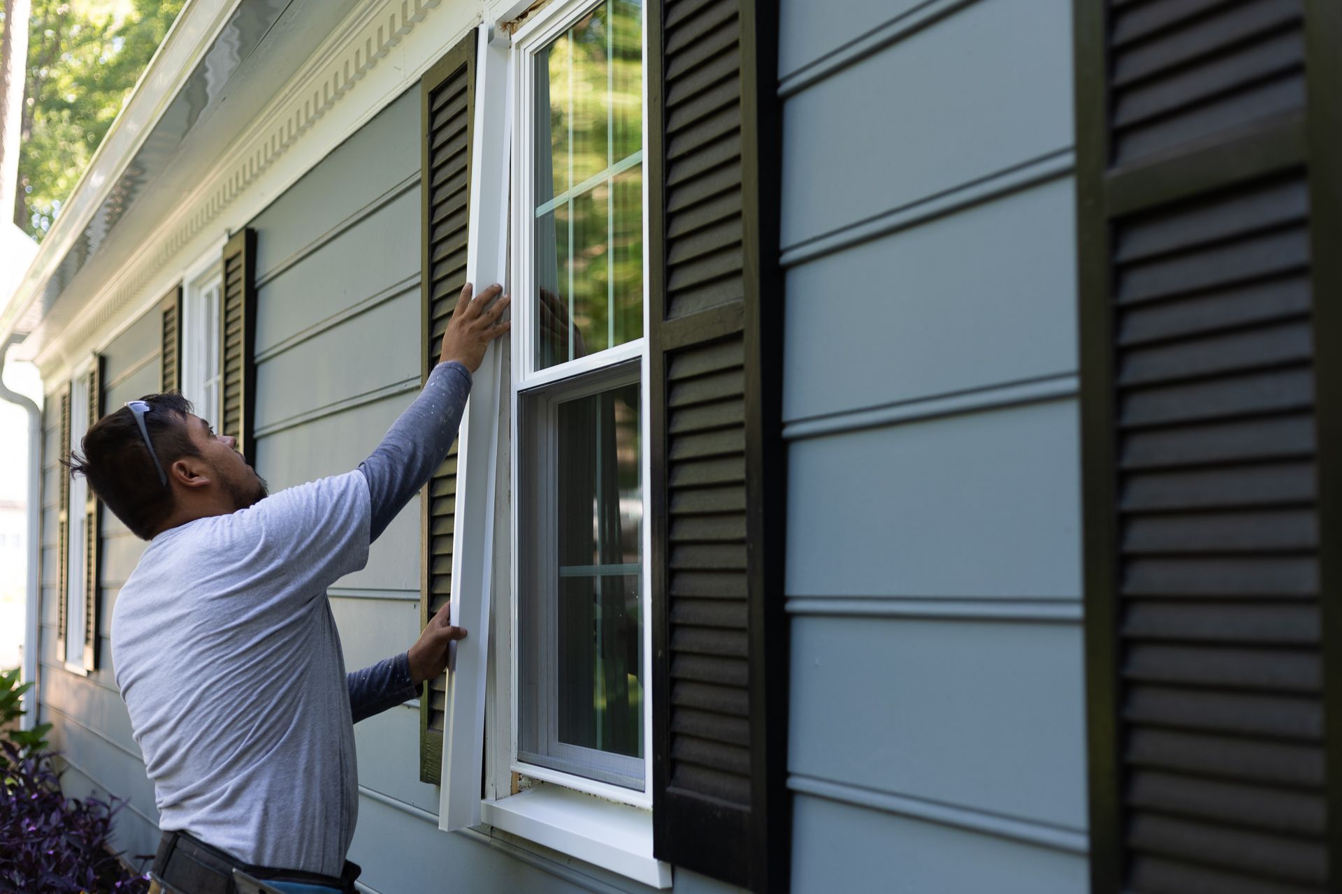 A during-install image of a RETEX window replacement in North Chesterfield VA.