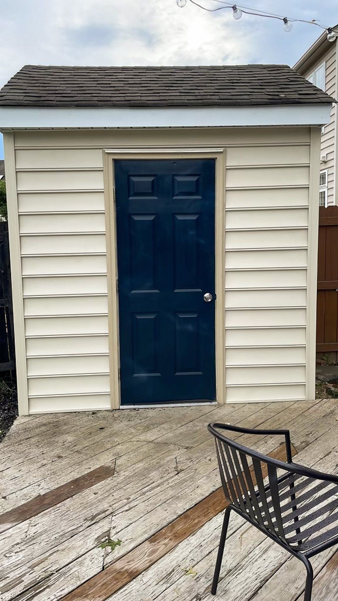 An after-install photo of a fire-damaged shed that RETEX replaced the siding, roof, and gutters for in Glen Allen VA.