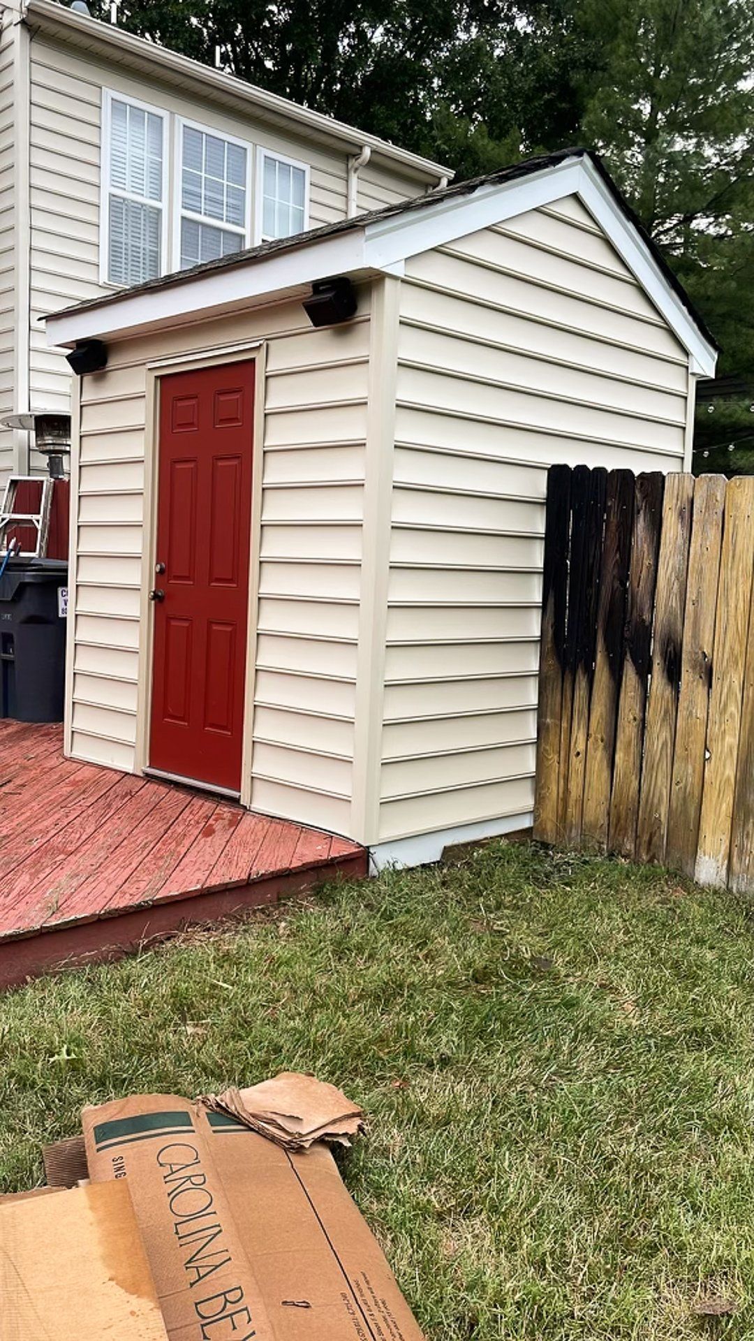 An after-install photo of a fire-damaged shed that RETEX replaced the siding, roof, and gutters for in Glen Allen VA.