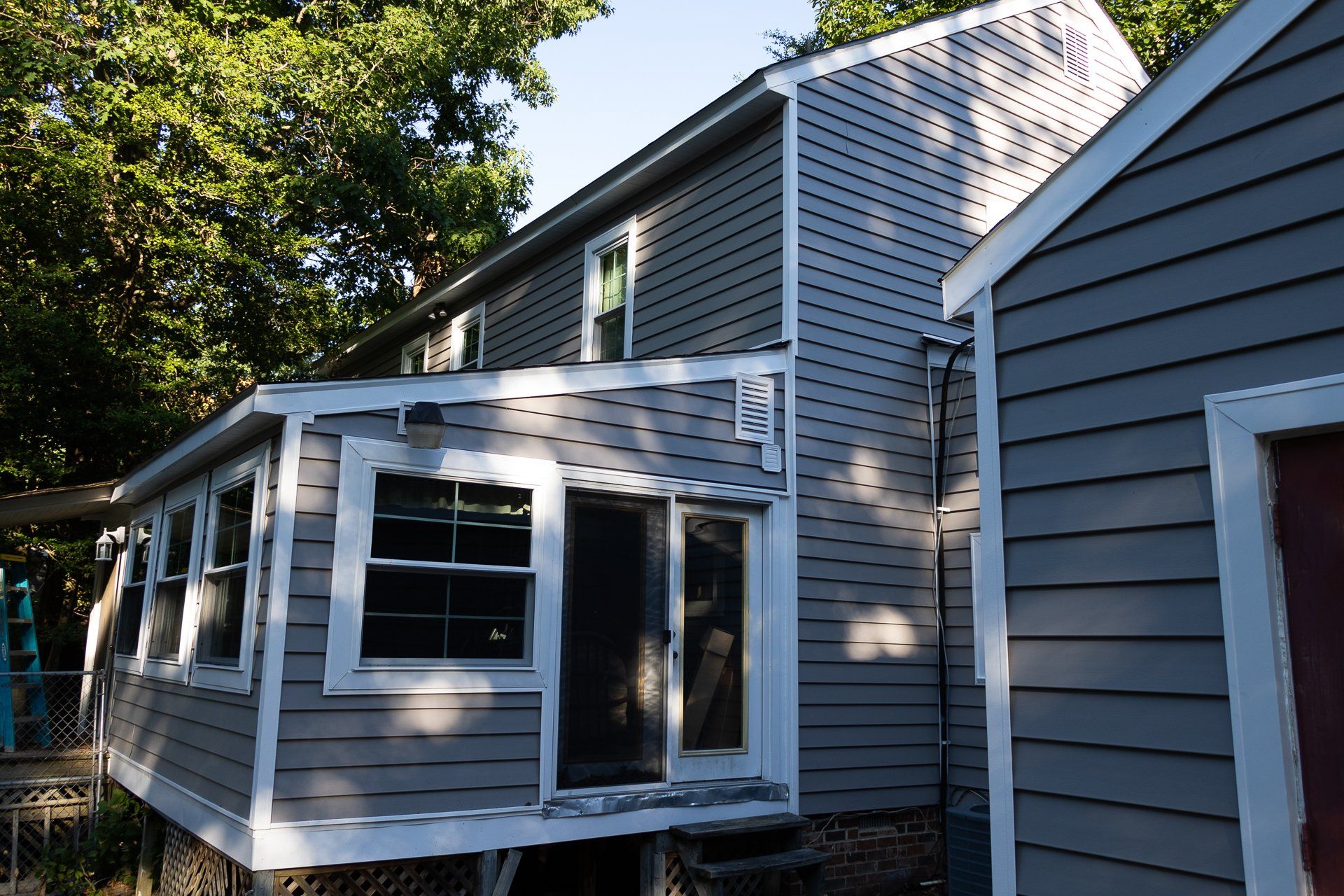After photo of RETEX insulated vinyl siding and window replacement in North Chesterfield VA 23235.