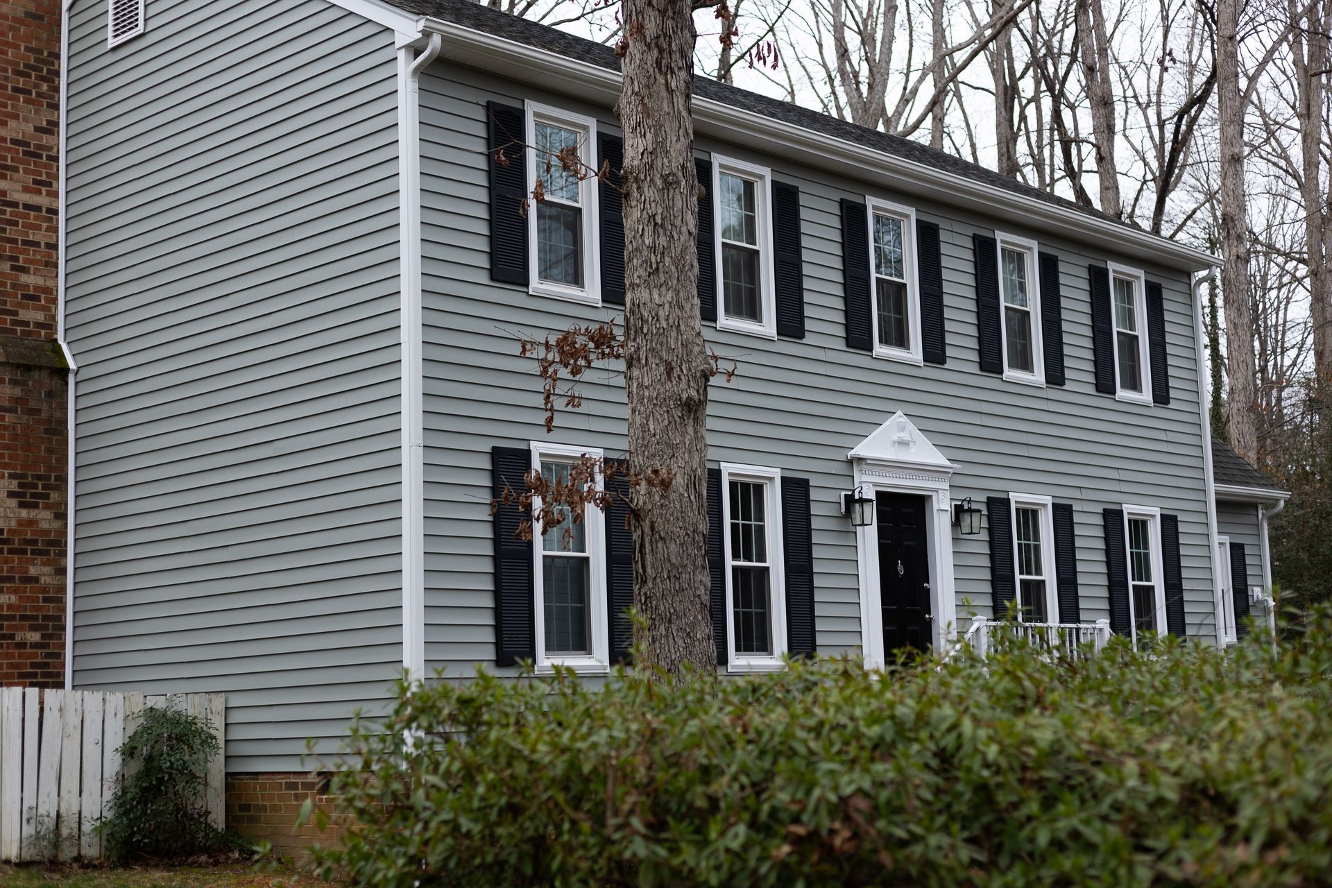 A during-install photo of a RETEX siding replacement in North Chesterfield VA 23235. Certainteed Cedarboard vinyl siding.