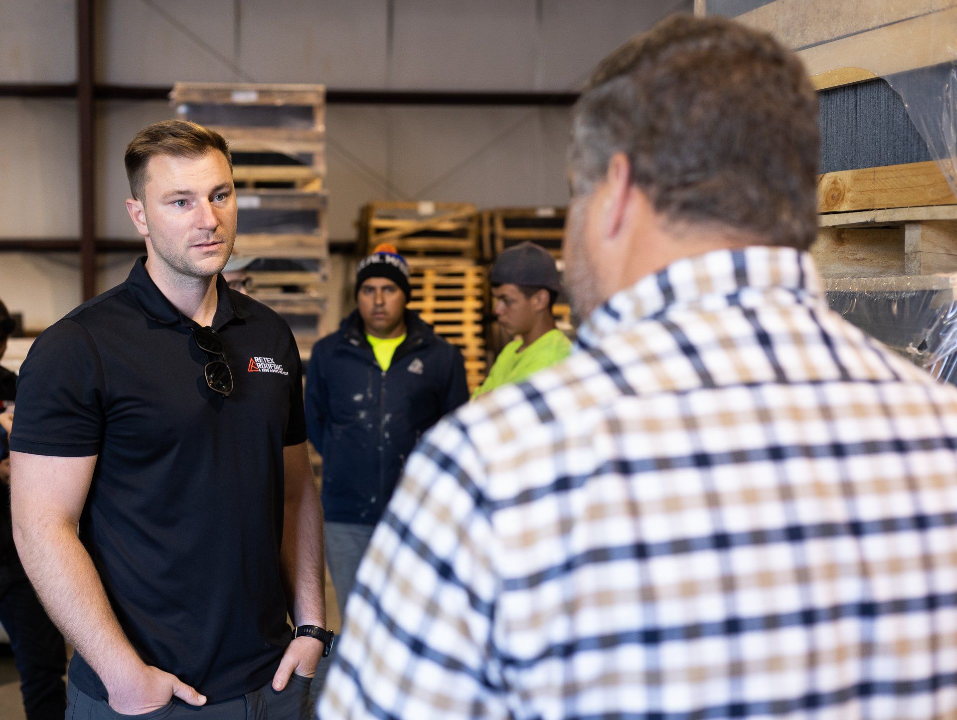 An image of RETEX's Josh Lewis learning about natural slate during a team training event.
