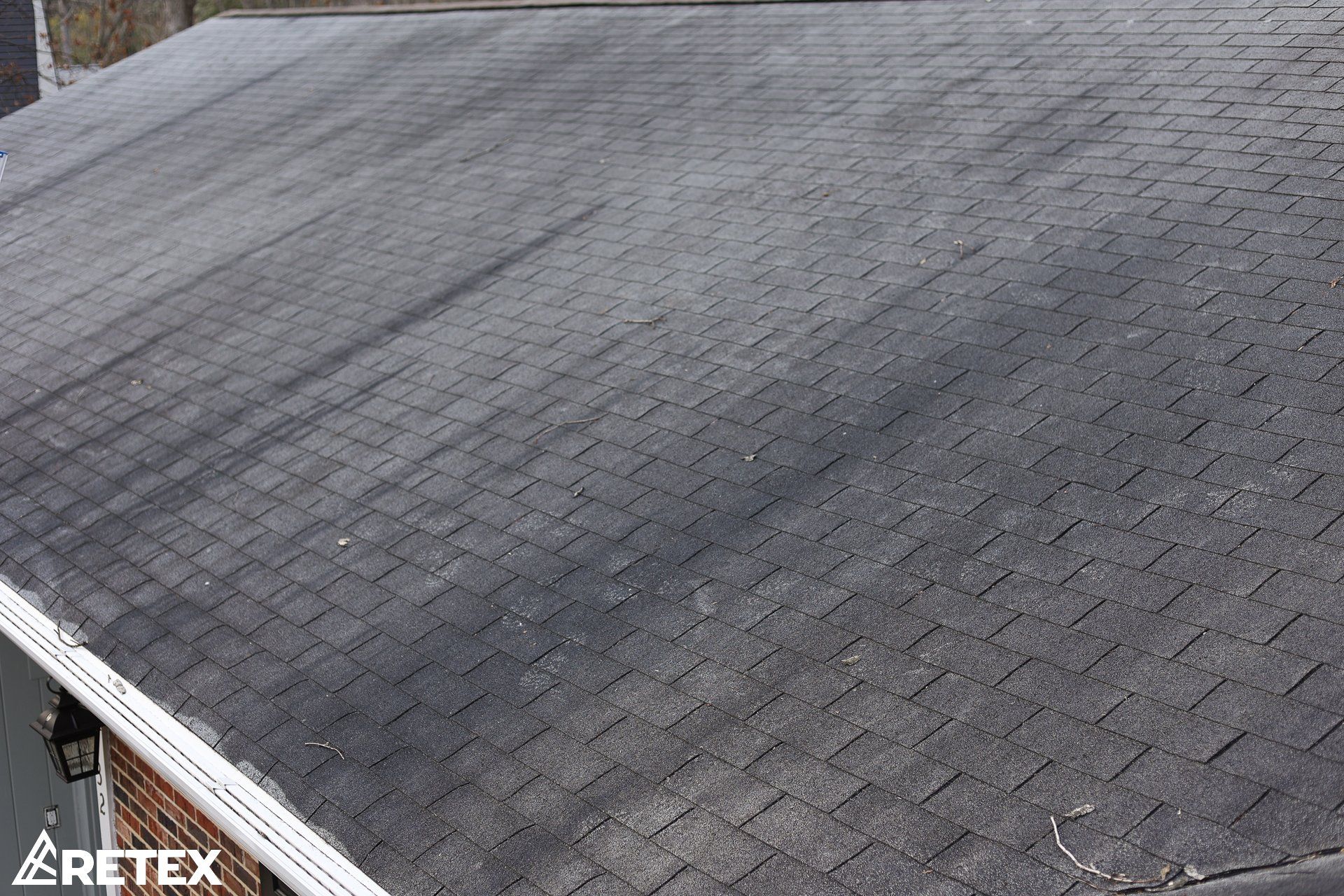 Image of an old asphalt shingle roof in Richmond, VA 23235.