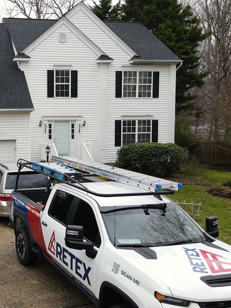 Retex roofing truck outside home RETEX replaced roof for in March 2022. Roof replacement in Mechanicsville VA 23116.