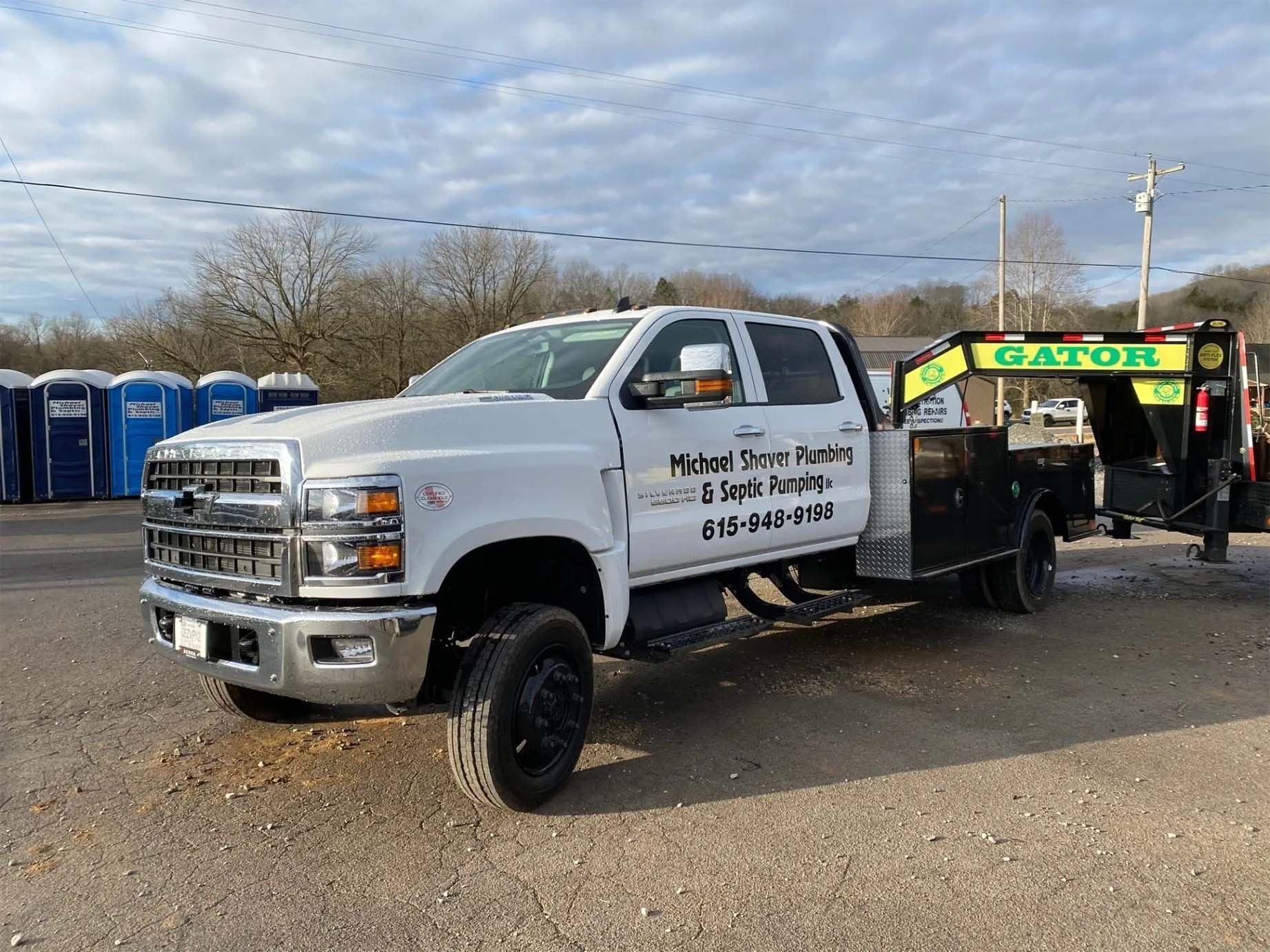Different tilted angle of company pick up truck — Bethpage, TN — Michael Shaver Plumbing & Septic Pumping
