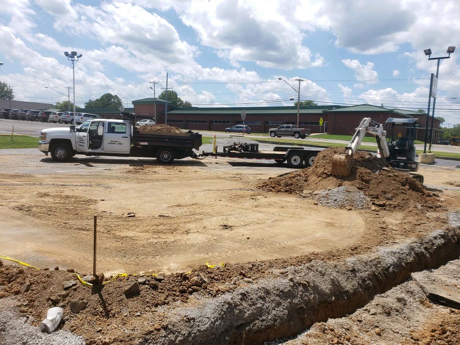 Pick up truck with dirt pile on it — Bethpage, TN — Michael Shaver Plumbing & Septic Pumping