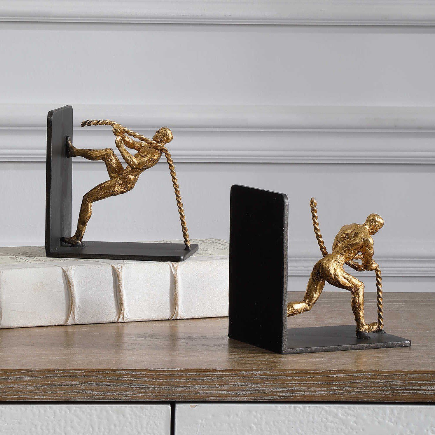 Antique human figurine bookends plated in gold are charming and unique