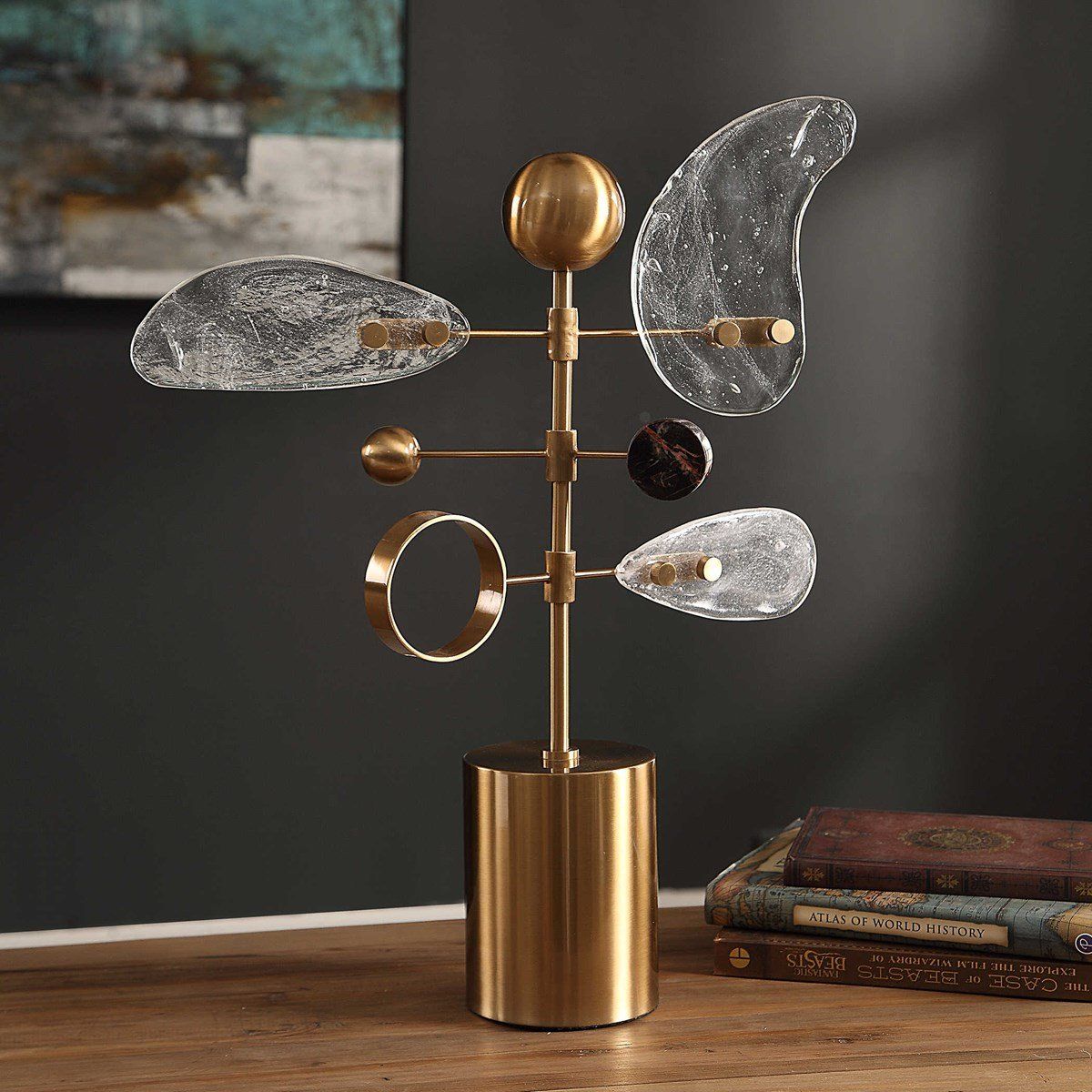 Gold abstract sculpture with geometric shapes