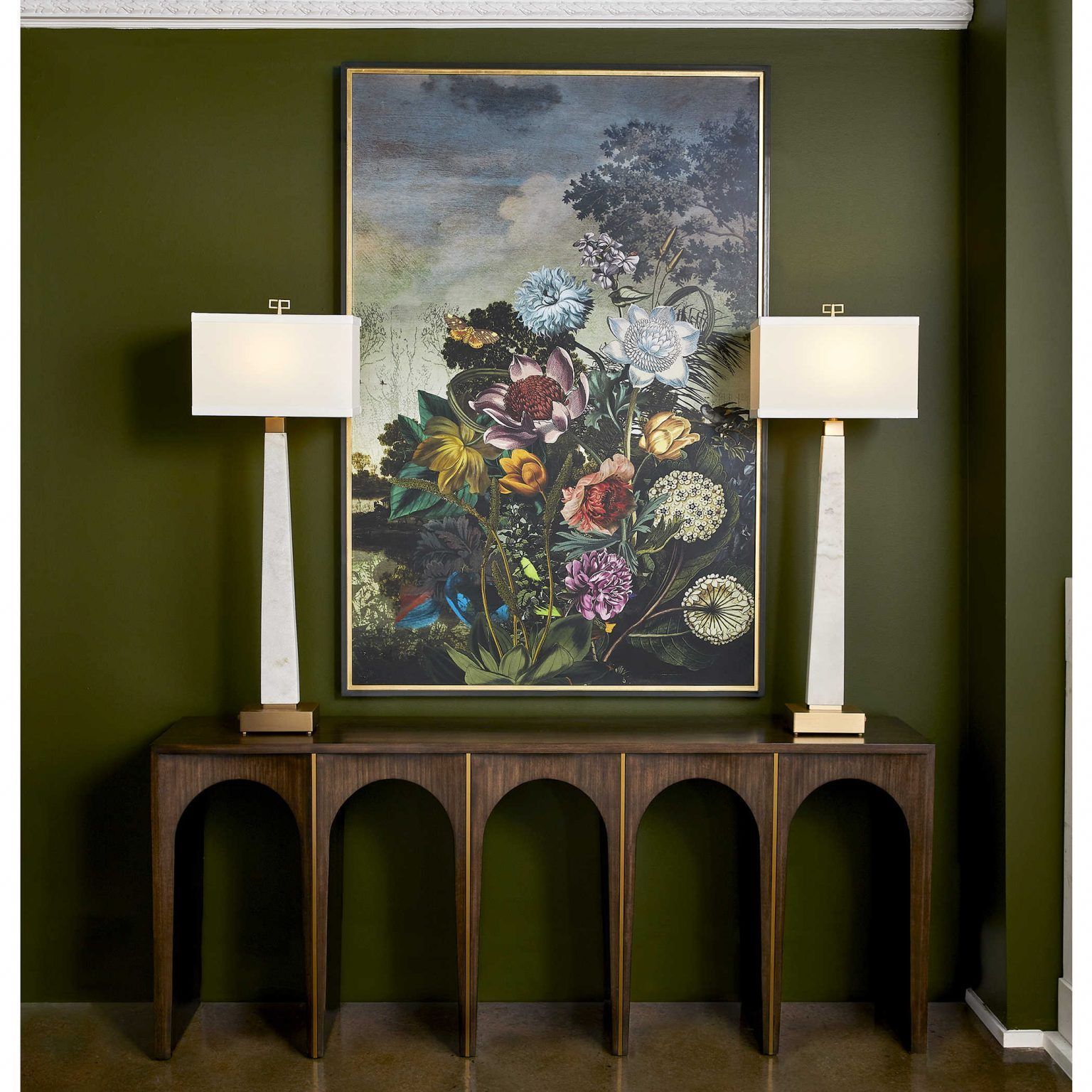 Retro-chic floral print is framed by trendy mid-century lamps and home decor