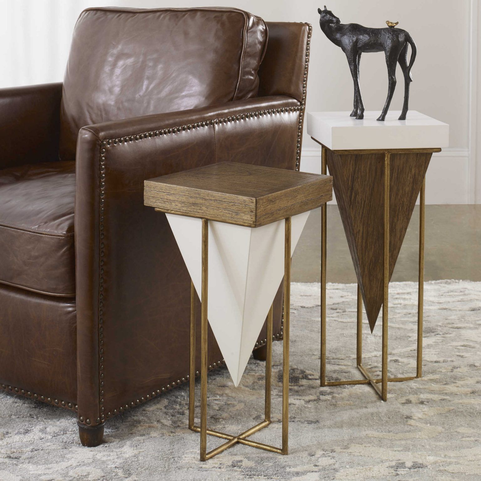 Accent tables featuring geometric shapes and mixed wood give a modern-retro feel to your decor