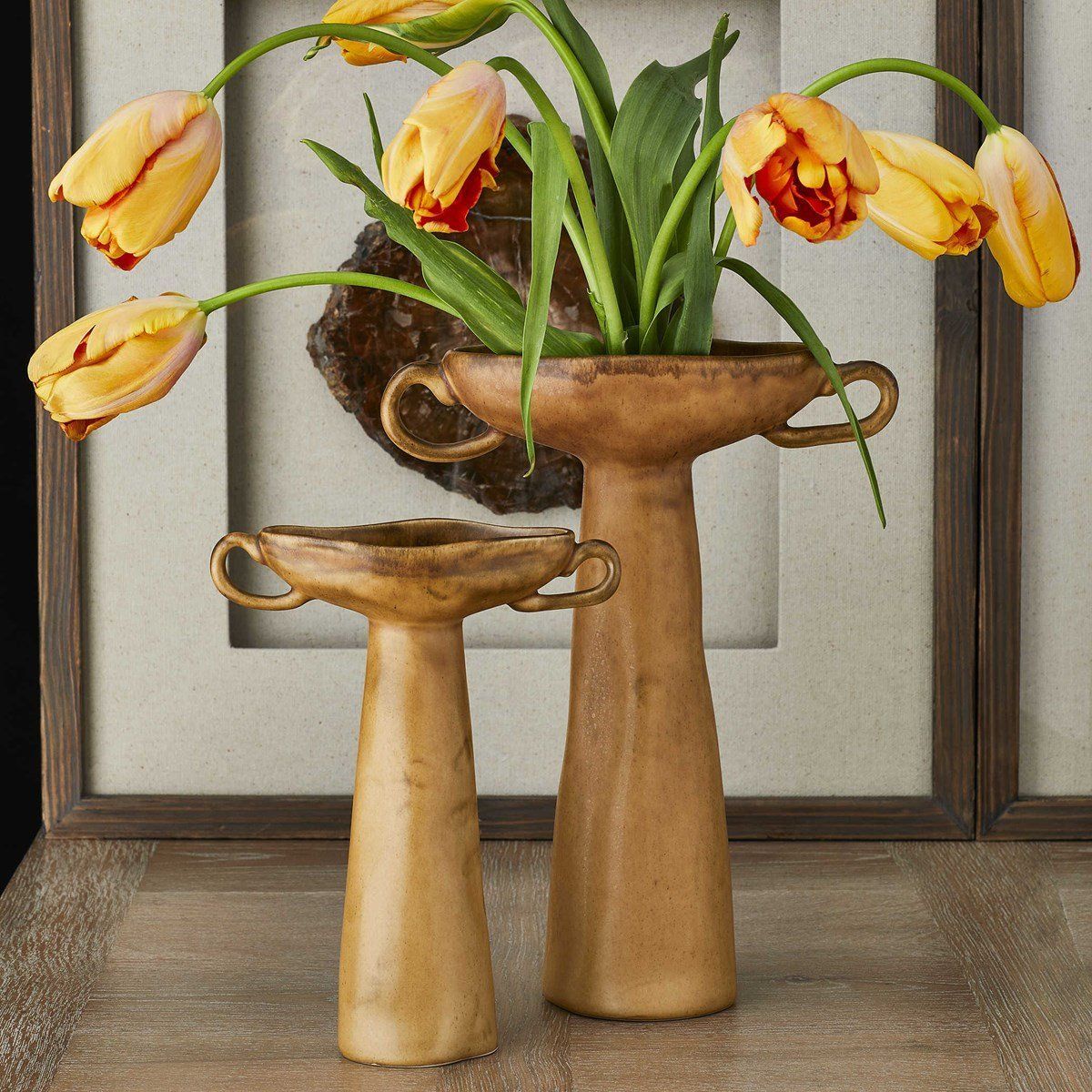 Warped gold vases look chic and retro