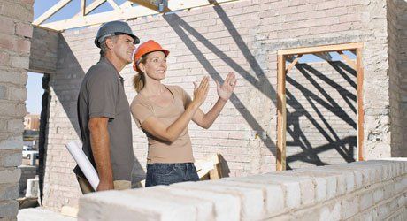 two people discussing about the plan of the house