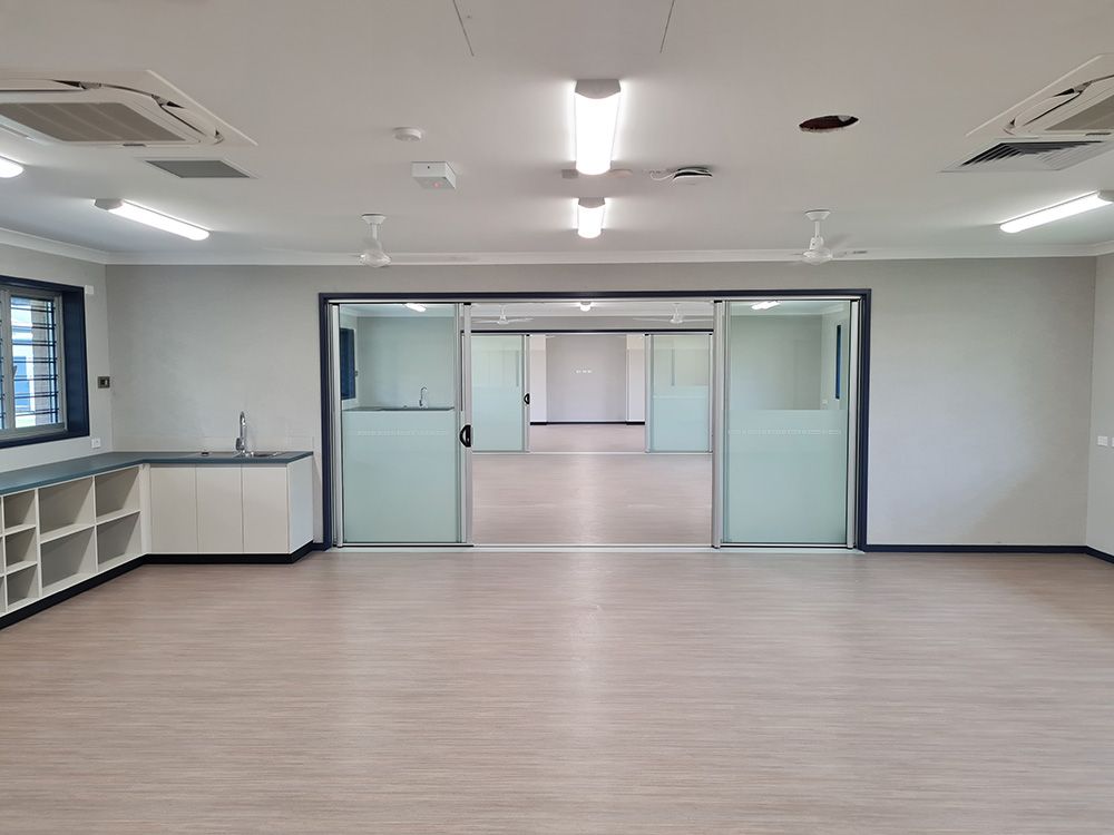 Sliding Doors In Classroom — Award-Winning Builders in Townsville, QLD