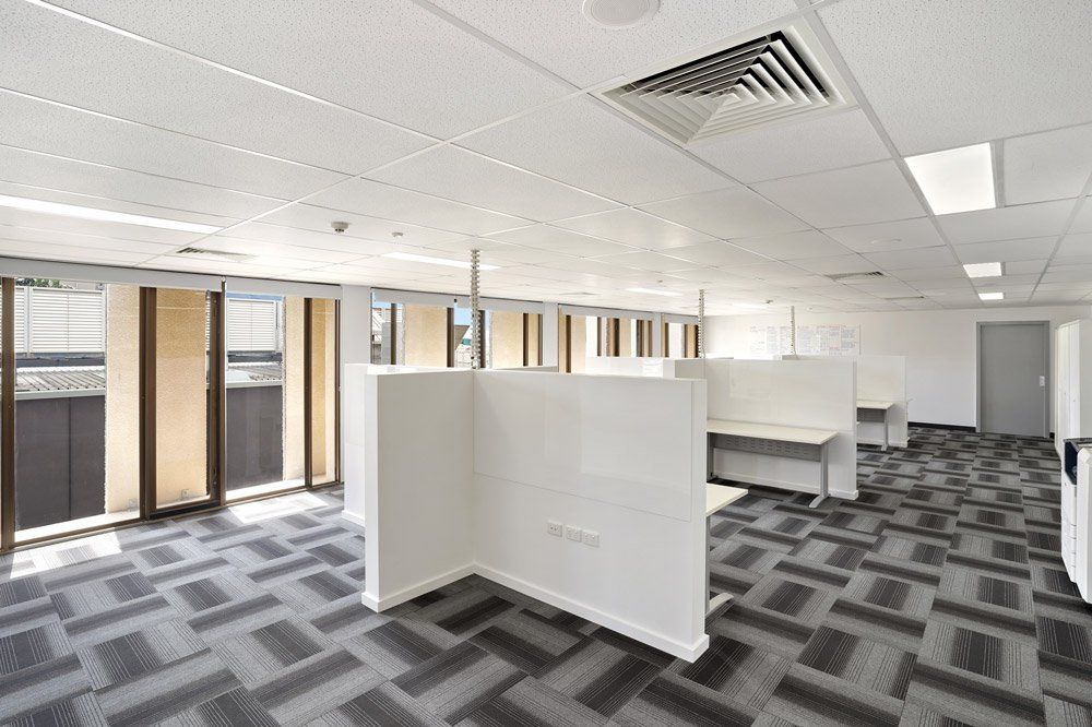 Commercial Properties Office with Professional Floor — Award-Winning Builders in Townsville, QLD