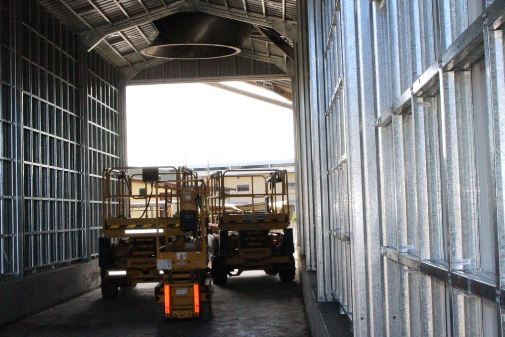 Bagasse transfer station with truck — Award-Winning Builders in Townsville, QLD