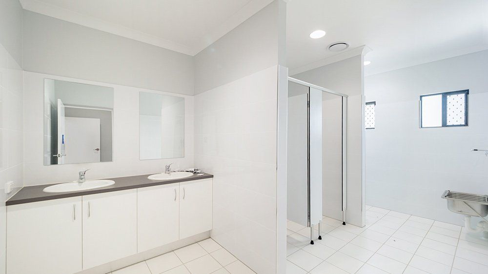 Toilet with Minimalist Style — Award-Winning Builders in Townsville, QLD