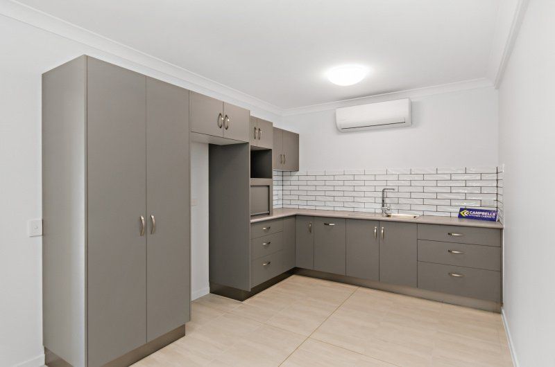Professional Excavations Facility with Cabinet — Award-Winning Builders in Townsville, QLD