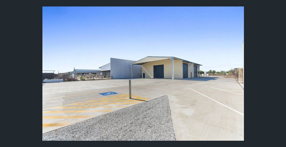 Mezzanine storage with carparking — Award-Winning Builders in Townsville, QLD
