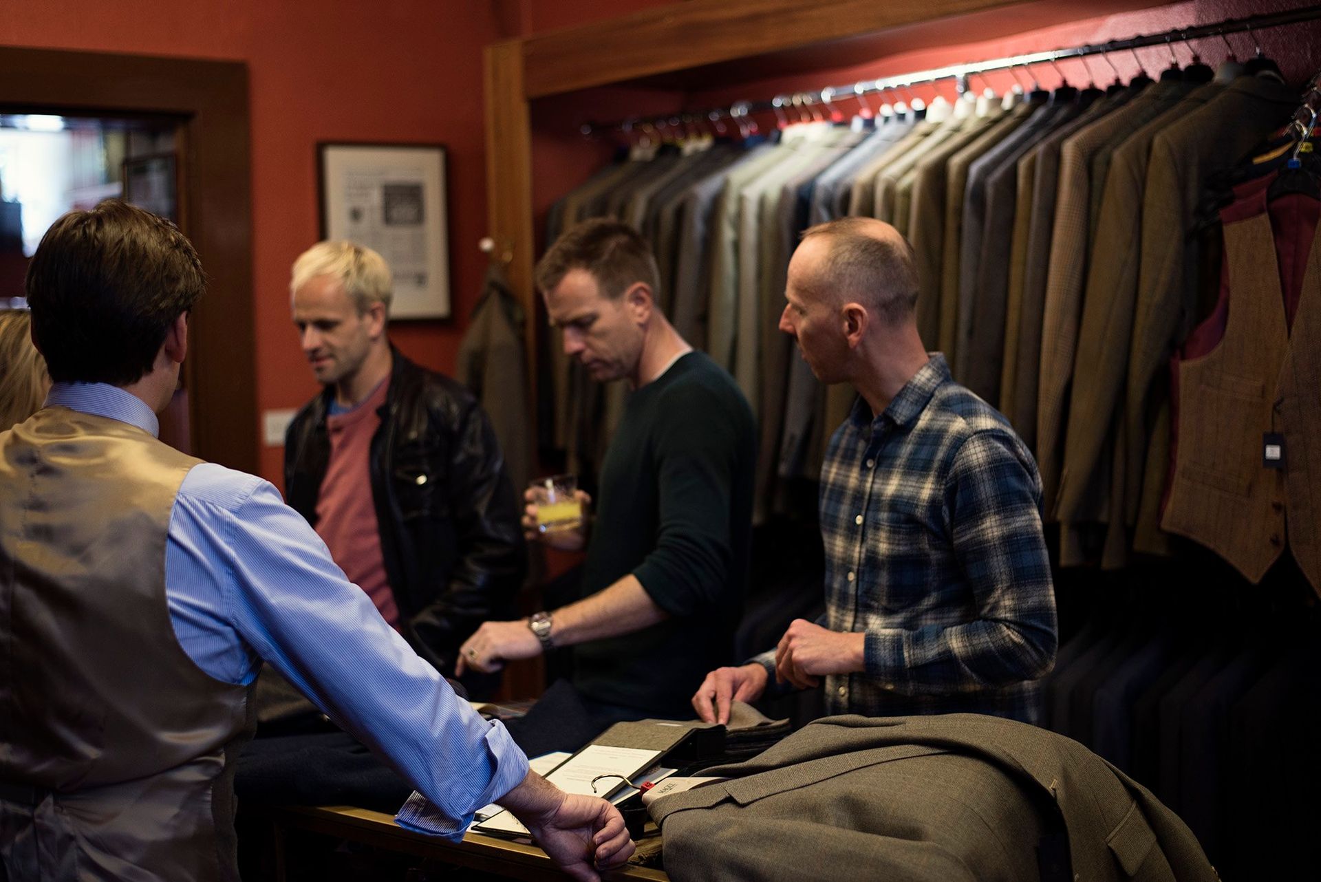 Ewen Bremner,   Ewan McGregor and Jonny Miller make choices of cloth for bespoke Stewart Christie & Co. suits. 