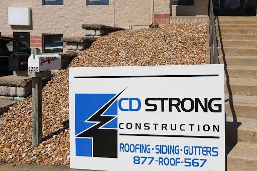 A sign for CD Strong Construction