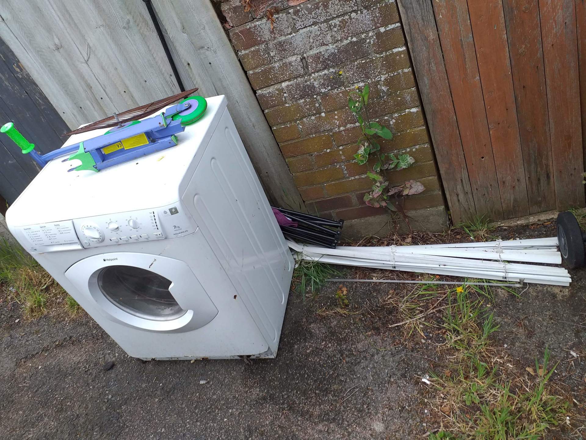 Washing machine ready for a free appliance collection in North Norfolk