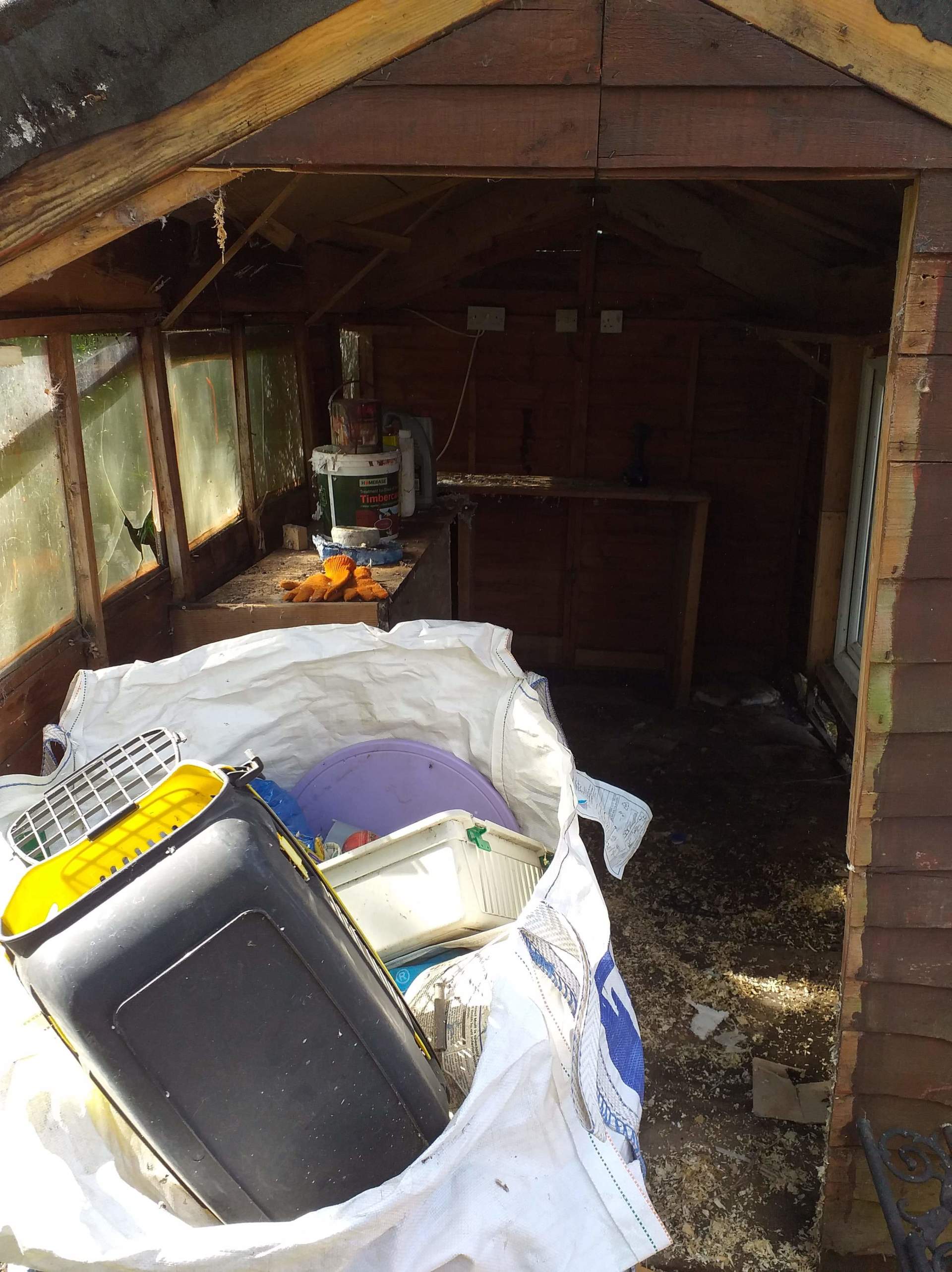 hand sorting on site  a shed clearance